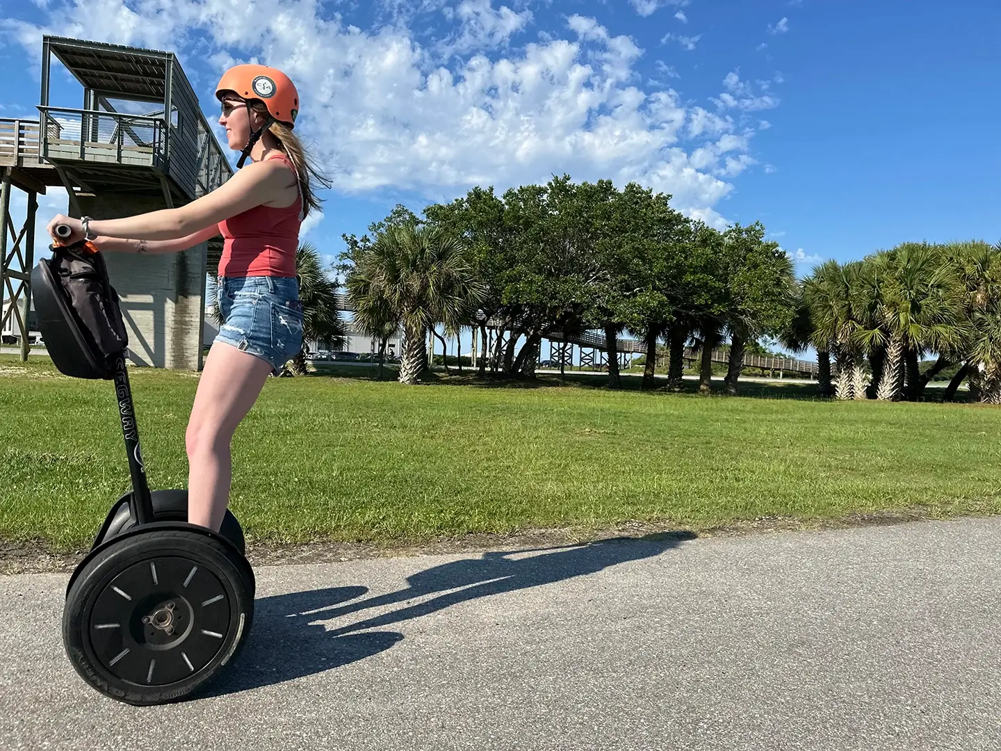 Segway rider on coastal path